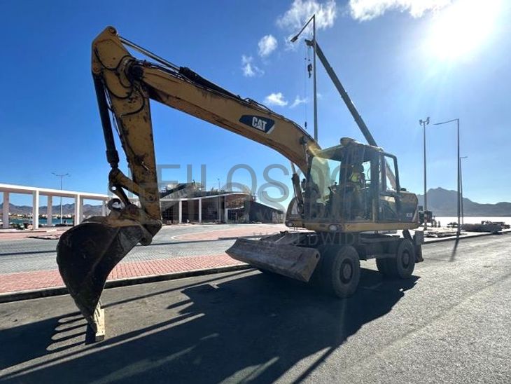 Escavadora de Pneus CATERPILLAR M315 D 