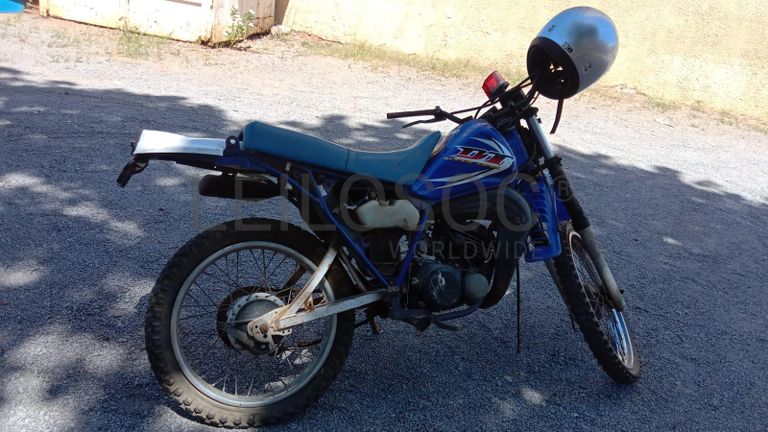 Motorizada de marca Yamaha DT 125 ·