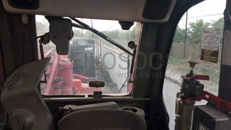 Empilhador Telescópico  MANITOU MHT 10210 ·