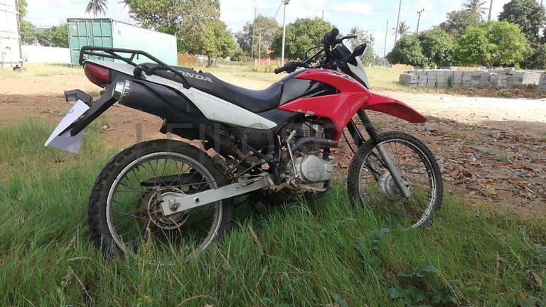 Motorizada de marca Honda XL 125 LEK ·