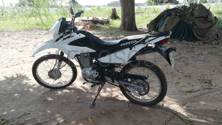 Motorizada de marca Honda XL LEK ·