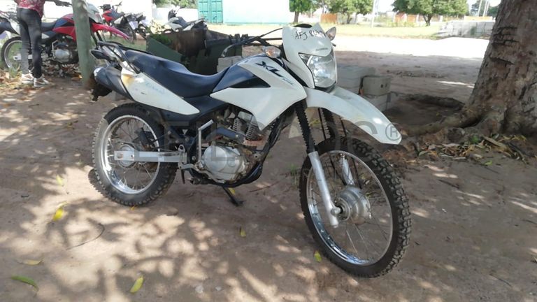 Motorizada de marca Honda XL LEK 125, ·