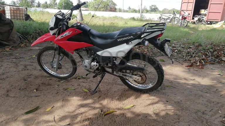 Motorizada de marca Honda XL 125 LEK · 