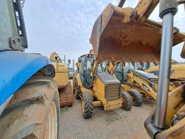 Retroescavadora (9 Ton.) CATERPILLAR 428E  · Viana