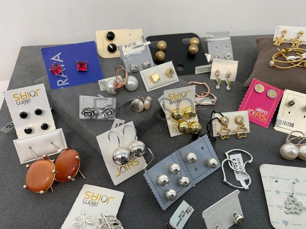 Brincos em prata e outros materiais