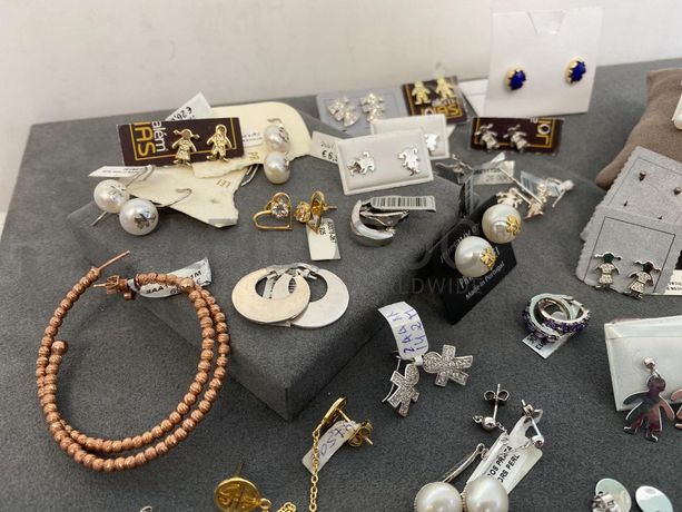 Brincos em prata e outros materiais