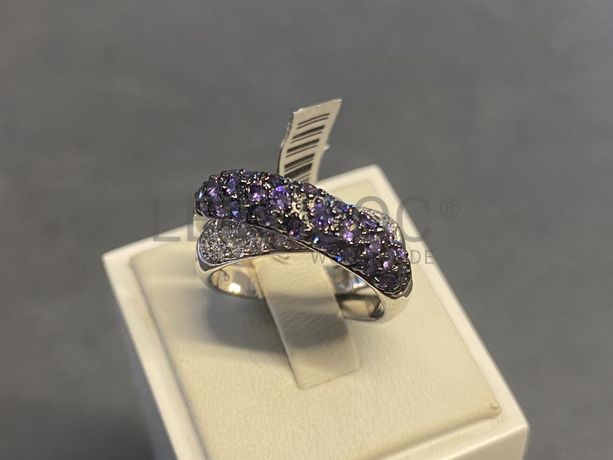 Anel em prata e outros materiais