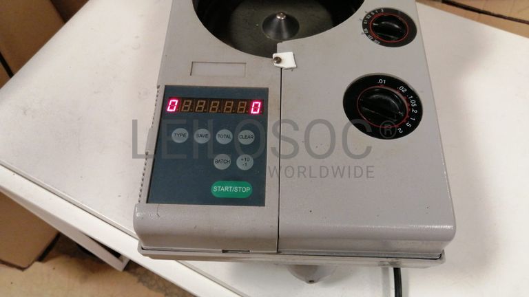 Máquina de contar moedas