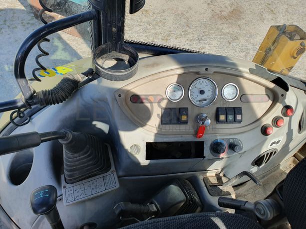 Retroescavadora Komatsu W93 R · Ano 2004