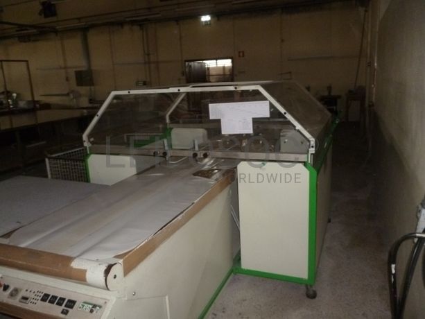 Máquina de dobrar e embalar