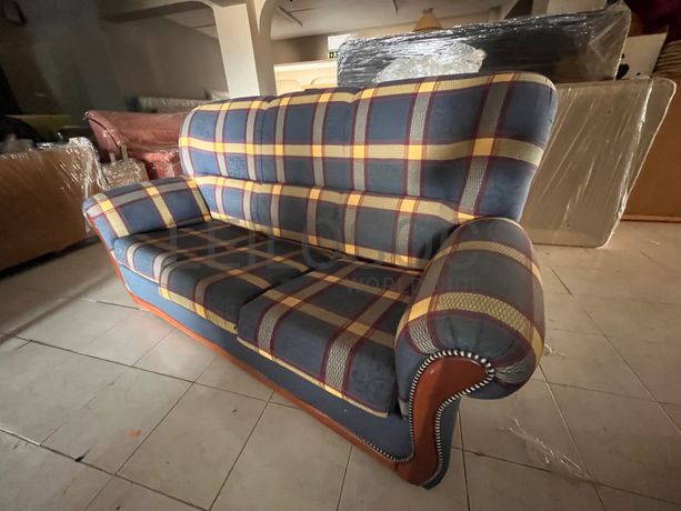 Sofá cama de três lugares