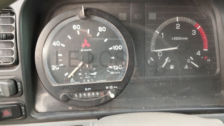 Mitsubishi Canter com caixa compactadora · Ano 2004