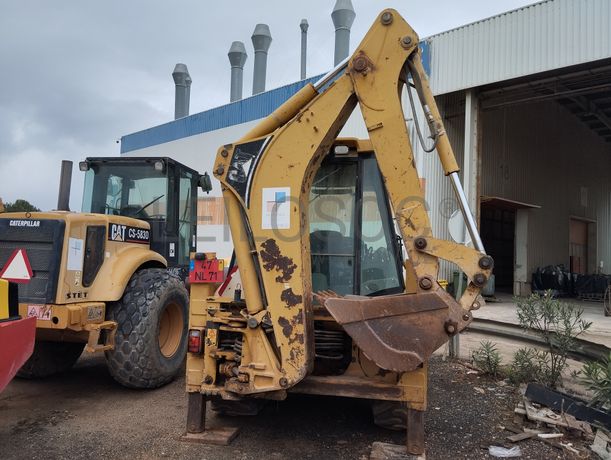 Conj. Ind. Pá e Retro de Pneus Caterpillar 428 DNF CM