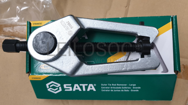 Extrator articulado esférico