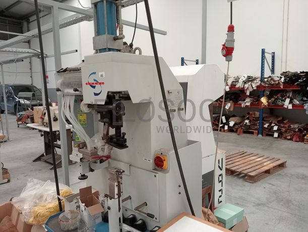 Máquina de pregar saltos