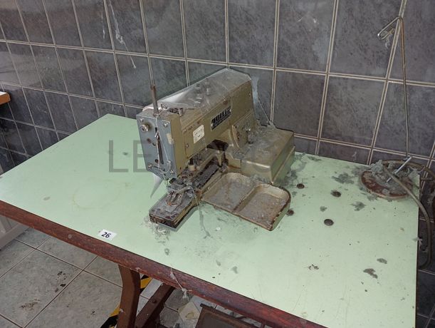 Máquina de pregar botões 