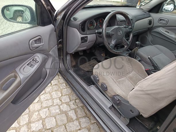 Nissan Almera II Hatchback 1.5 DCi · Ano 2003