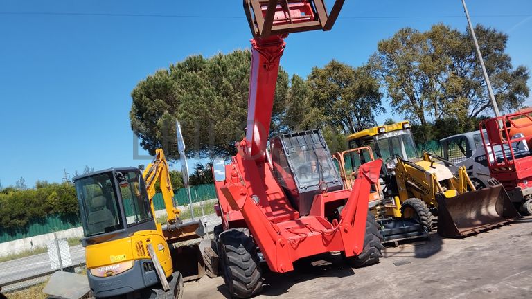 Multifunções telescópico Manitou 1230