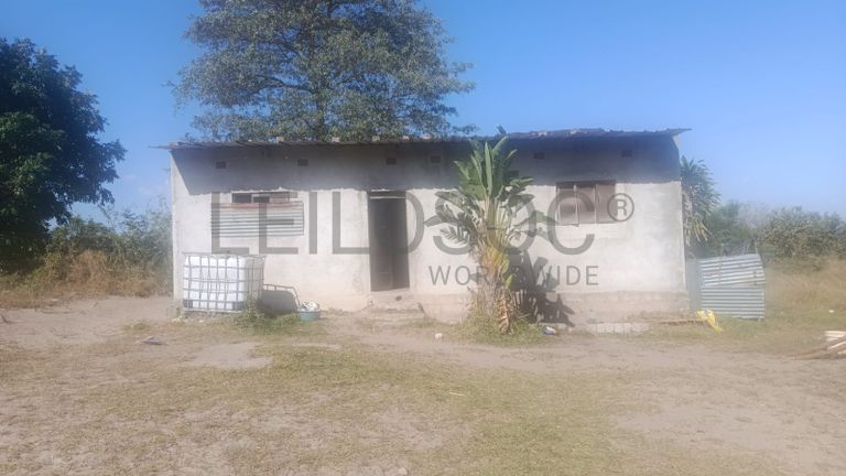 Infraestruturas em terreno com Vivenda T1 – Bairro Pateque