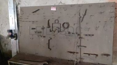 Quadro para pendurar peças