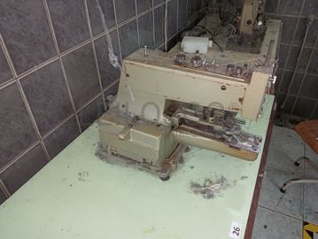 Máquina de pregar botões 